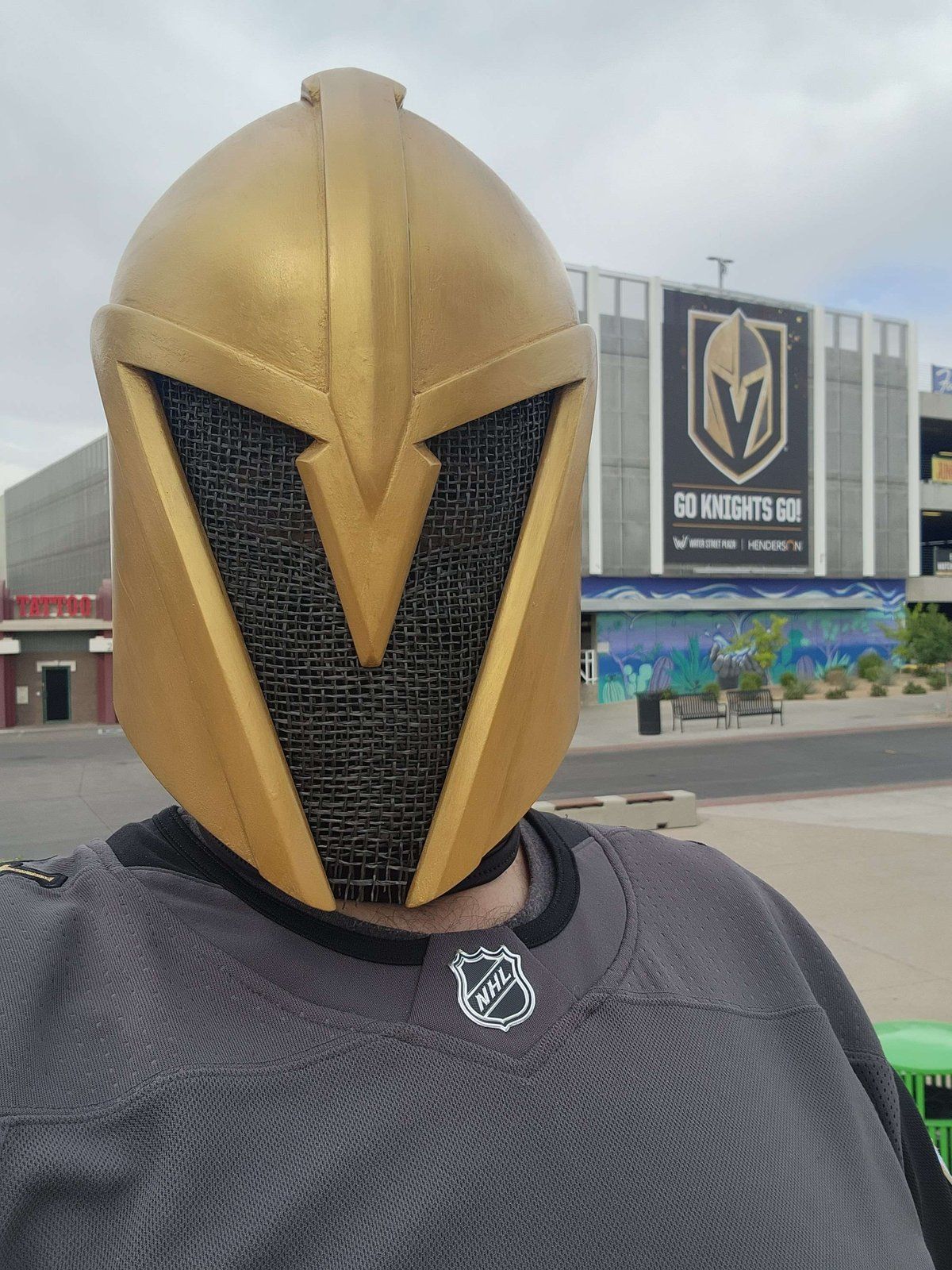 The 2023 helmet, with a mesh visor, outside the arena