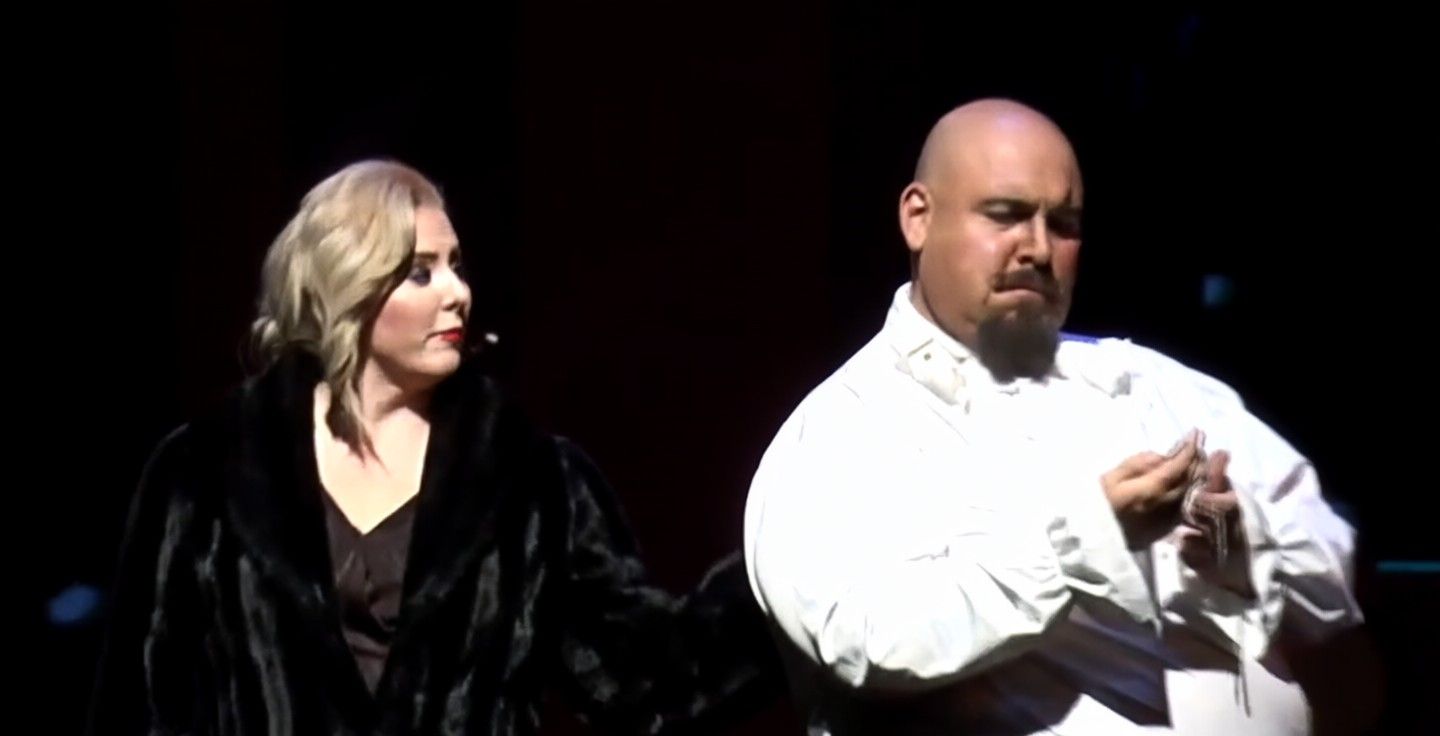 Darrell Calk as Mr. Darling, beside Mrs. Darling